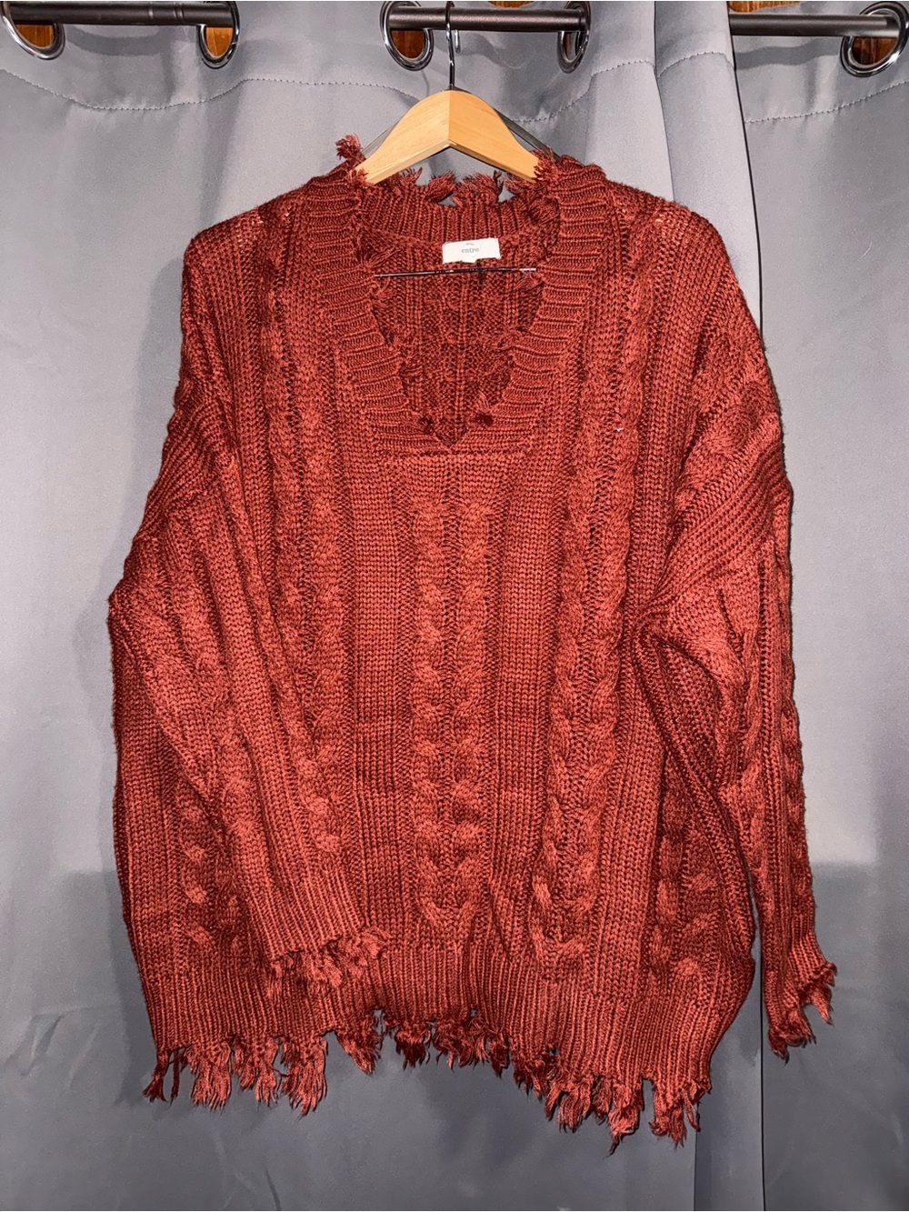 entro Distressed Cable-Knit V-Neck Sweater in Rust
